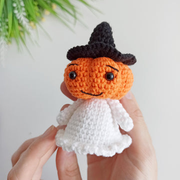 Halloween ghost with a pumpkin head
