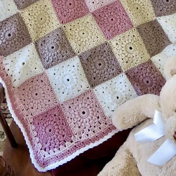 Wrapped in Sunbursts Baby Blanket - Lion Brand Mandala (DK Weight)