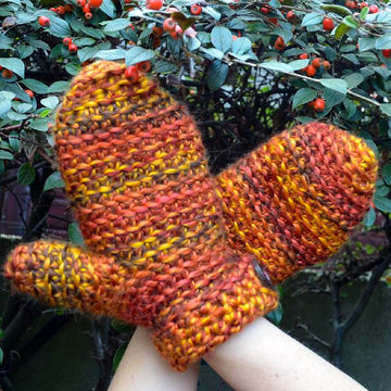 Mittens with a button
