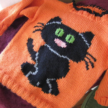 A Clowder of Cat Sweaters
