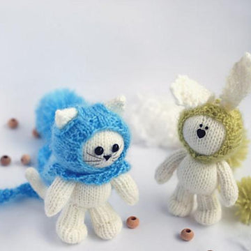 TWO FRIENDS : White cat in light blue hat and White rabbit in a light green hat