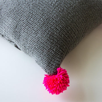 The Neon Pink Pompom Pillow