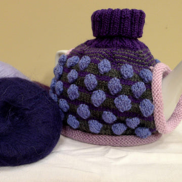 The colour Purple Tea Cosy