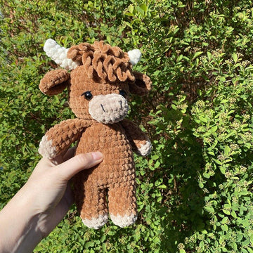 Highland cow with overalls