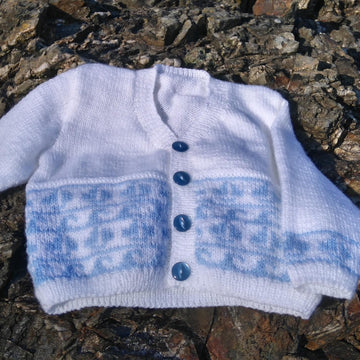Two baby fairisle cardigans with boats and hearts
