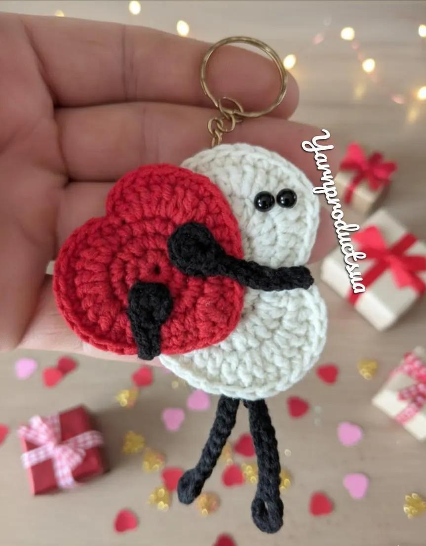 Two Hearts Hugging keychain english_us