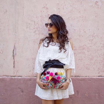 Pom Pom Clutch Bag