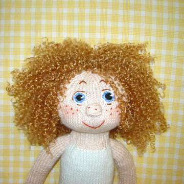 Knitting pattern of a cute ballerina doll, 15 inc, for a girl's Christmas gift