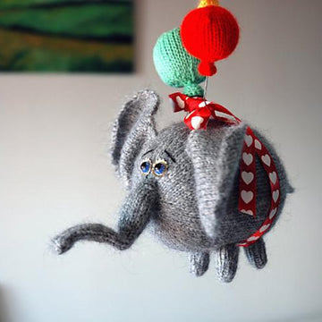 Airy-Fairy Flying elephant with 3 balloons ( knitted round )