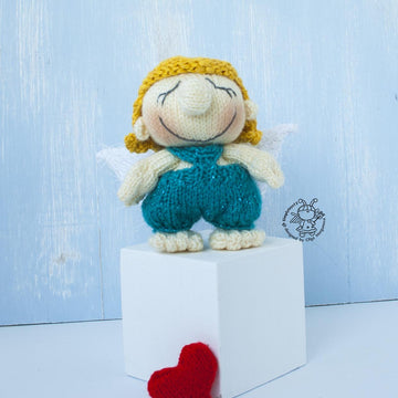 Small Cupid doll knitting flat