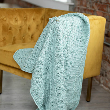 Cabled Blooms Blanket