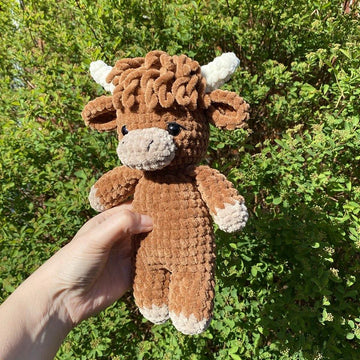 Highland cow with overalls