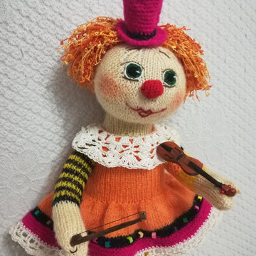 Knitting doll clown girl