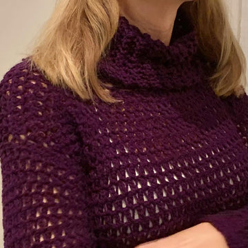 WRAPPED IN CHAINS SWEATER