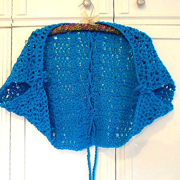839 PEACOCK SHRUG