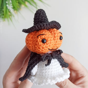Halloween ghost with a pumpkin head