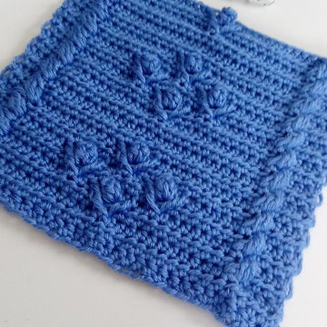 Cabled Blooms Blanket