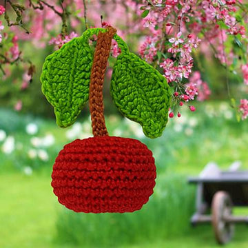 Cherry with stalk and leaves