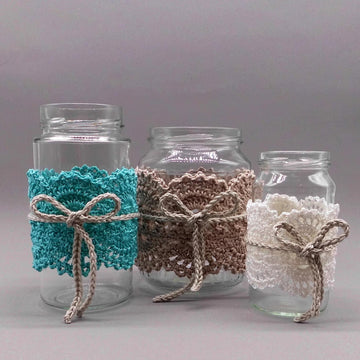 Crochet shabby style decoration from scraps of yarn for used glasses