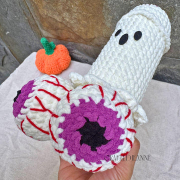 Cheeky ghost with a lift-off pumpkin hat
