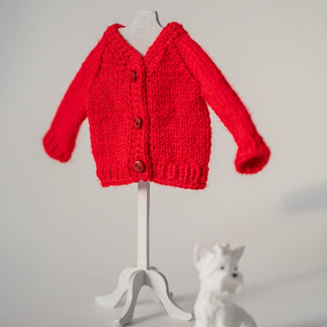 Knitted red cardigan for doll