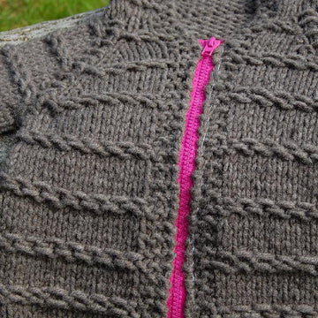 Enveloping baby cardigan