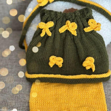 Knitting toy clothes for goose