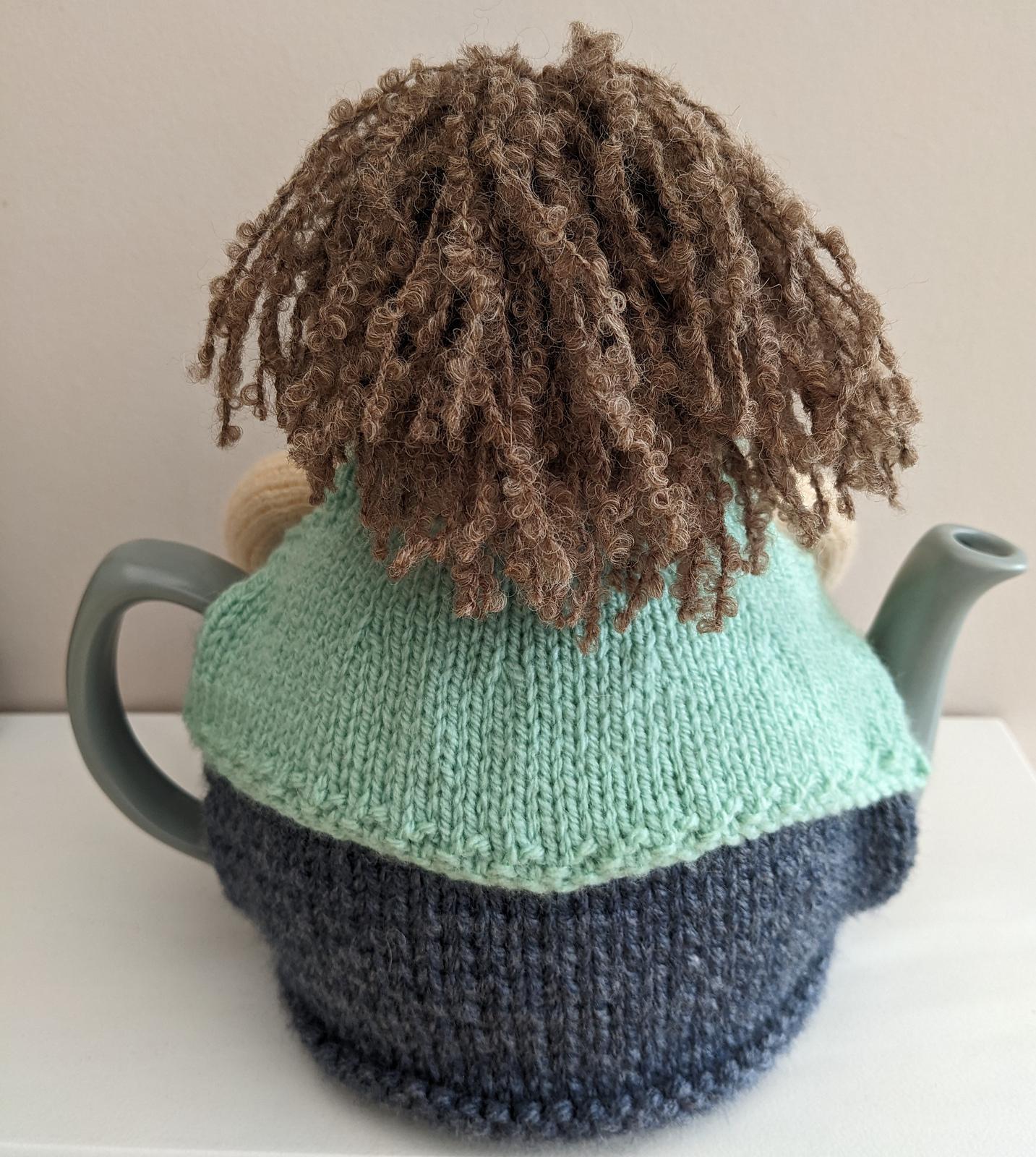 Betty takes up yoga tea cosy