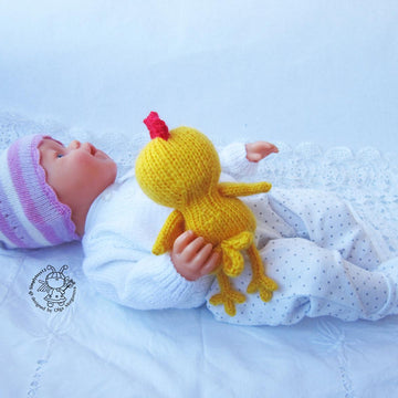 Toy for sleep. Chicken for small babies