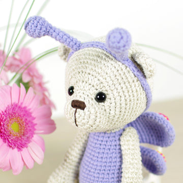 Teddy bear in a butterfly costume