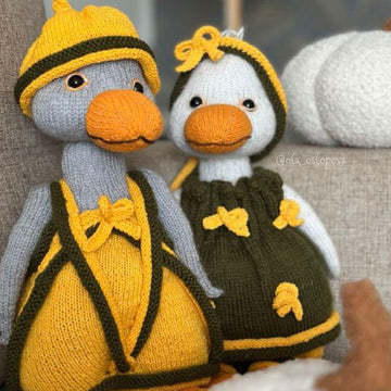 Knitting toy clothes for goose