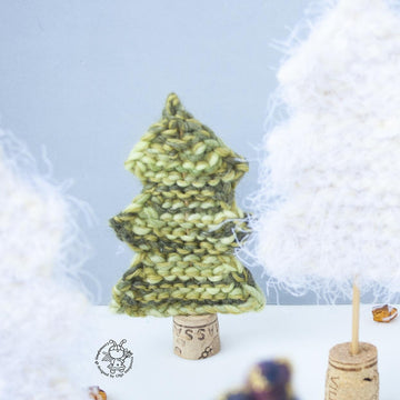 Many Christmas trees knitted flat