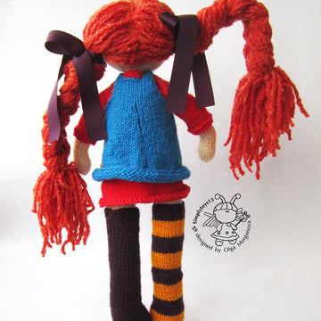 Mischievous red-haired doll