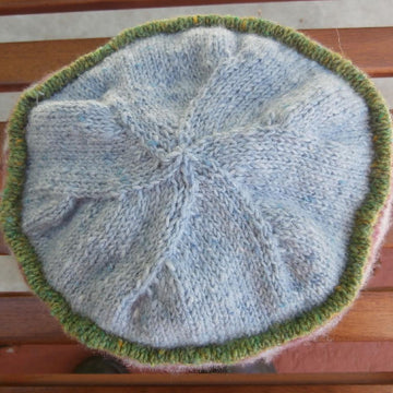 Flowers in winter scarf and hat