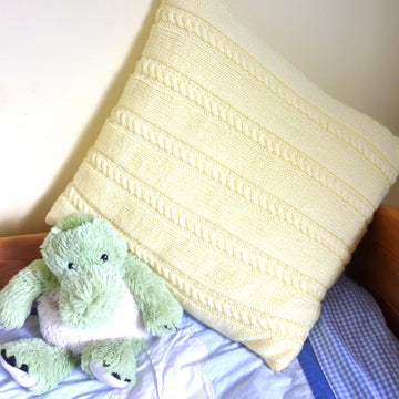 Cabled cushion cover