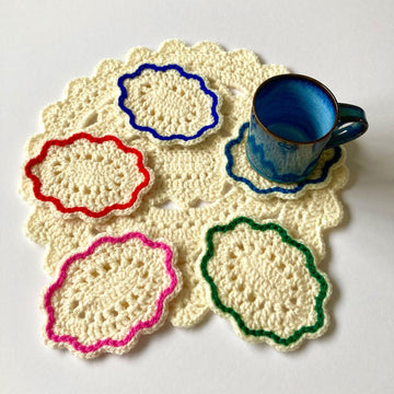 Oval placemat and coaster set by HueLaVive