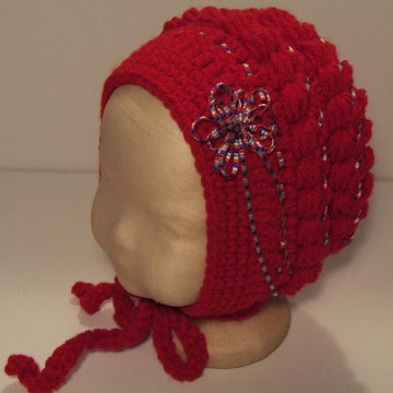 Bonnet with Frills, Bobbles, Flowers & Trims