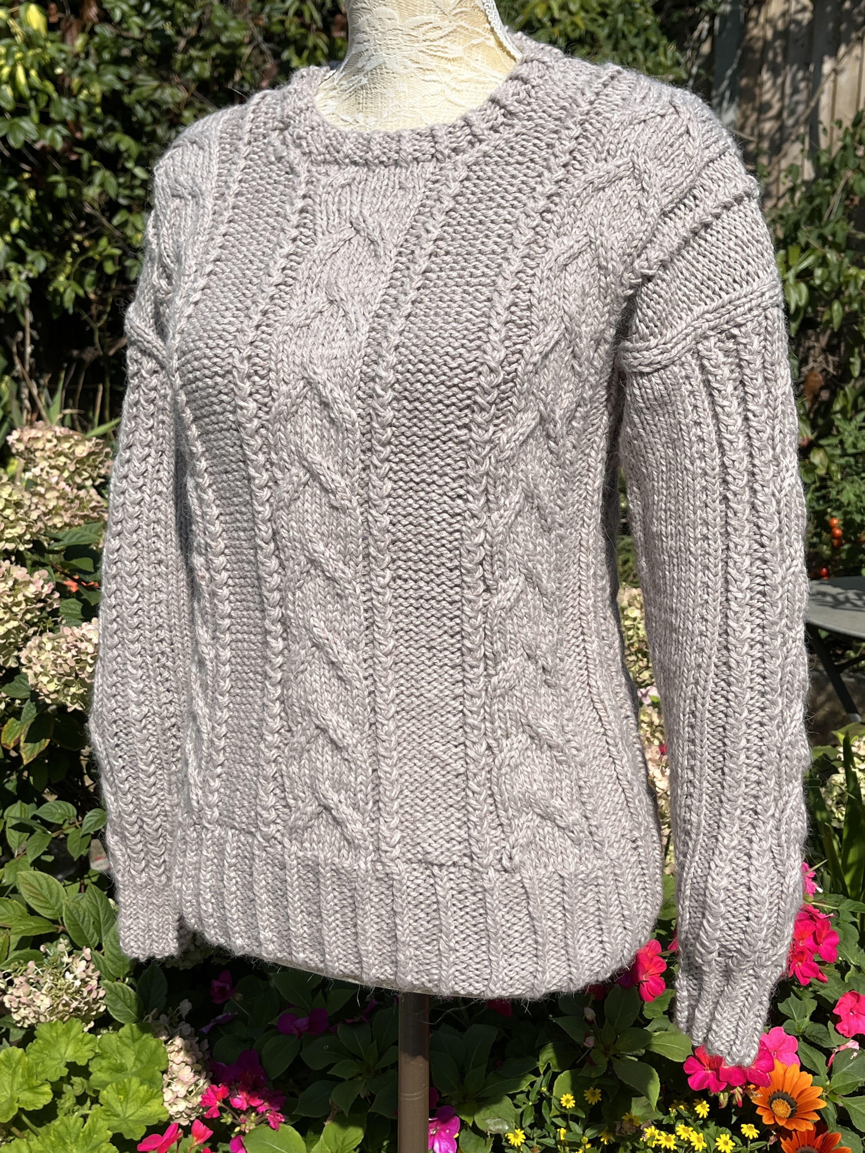 SOFTLY CABLED NEAT FITTING SWEATER