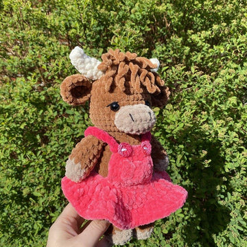 Highland cow with pinafore