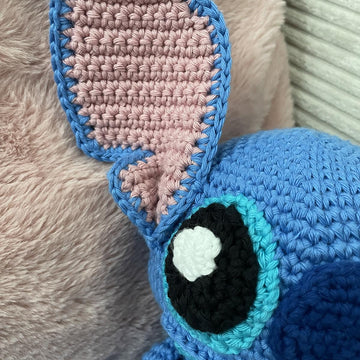 Blue alien amigurumi doll