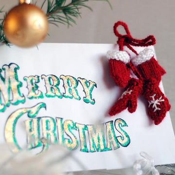 Small mittens for christmas or new year greeting card.