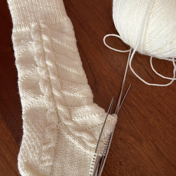 White socks with cables