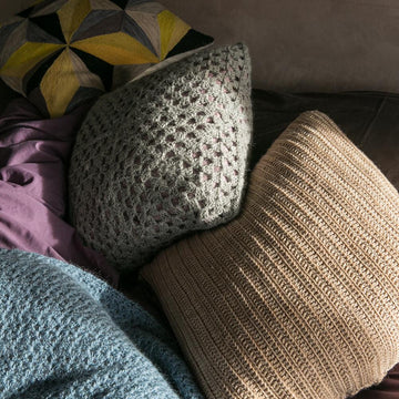 Envelope cushion