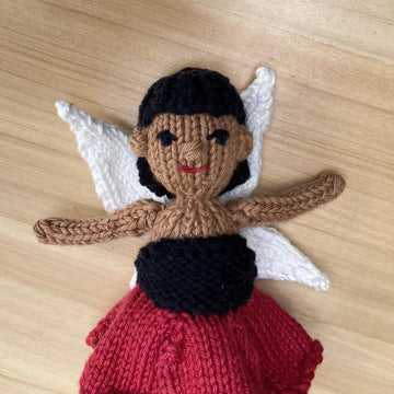 Poppy the flower fairy doll