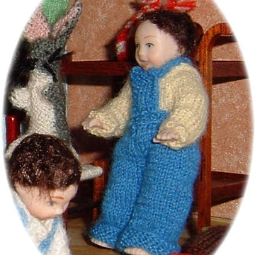 1:12th scale Toddlers dungarees, skirt and jumpers c. 1950s