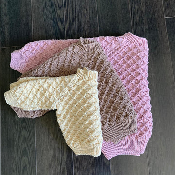Solgull sweater