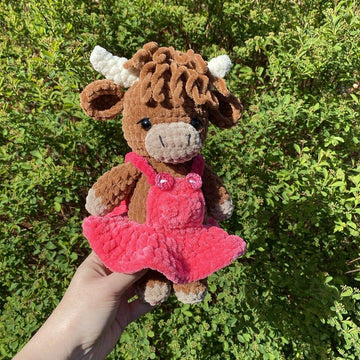 Highland cow with pinafore