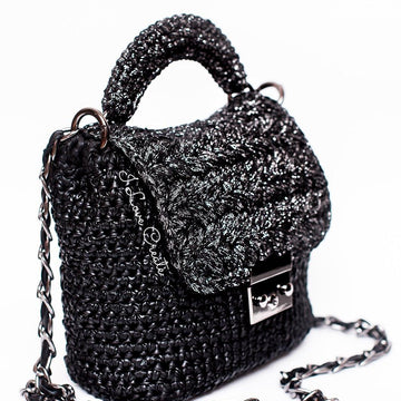 Bag with puff stitch flap
