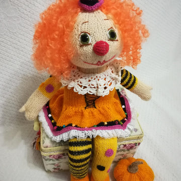 Knitting doll clown girl