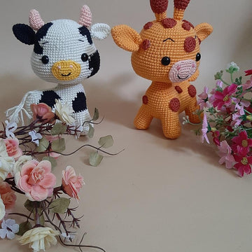 The little Cow and Giraffe